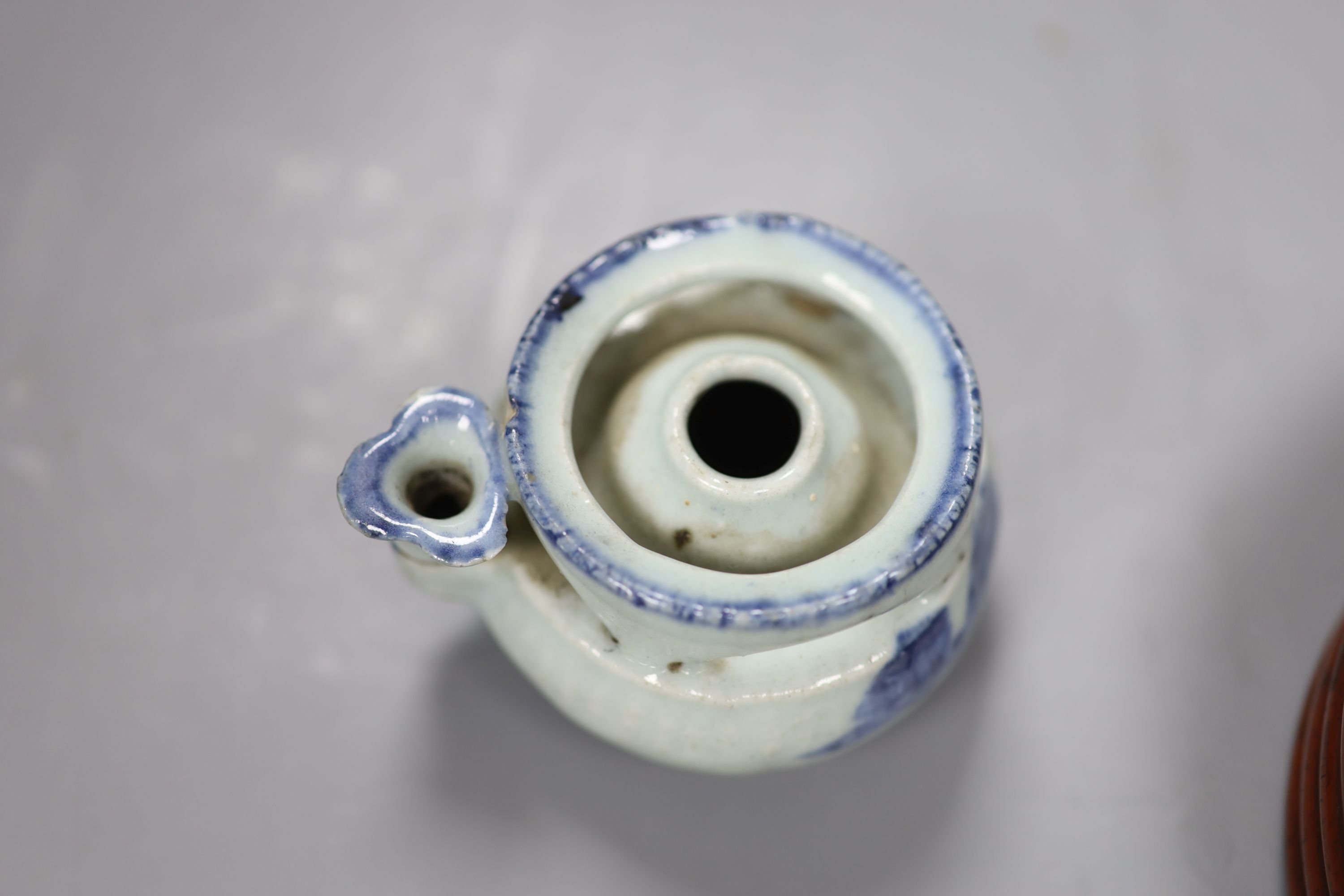 A Chinese red lacquer lidded box, diameter 12.5cm, and a blue and white water dropper